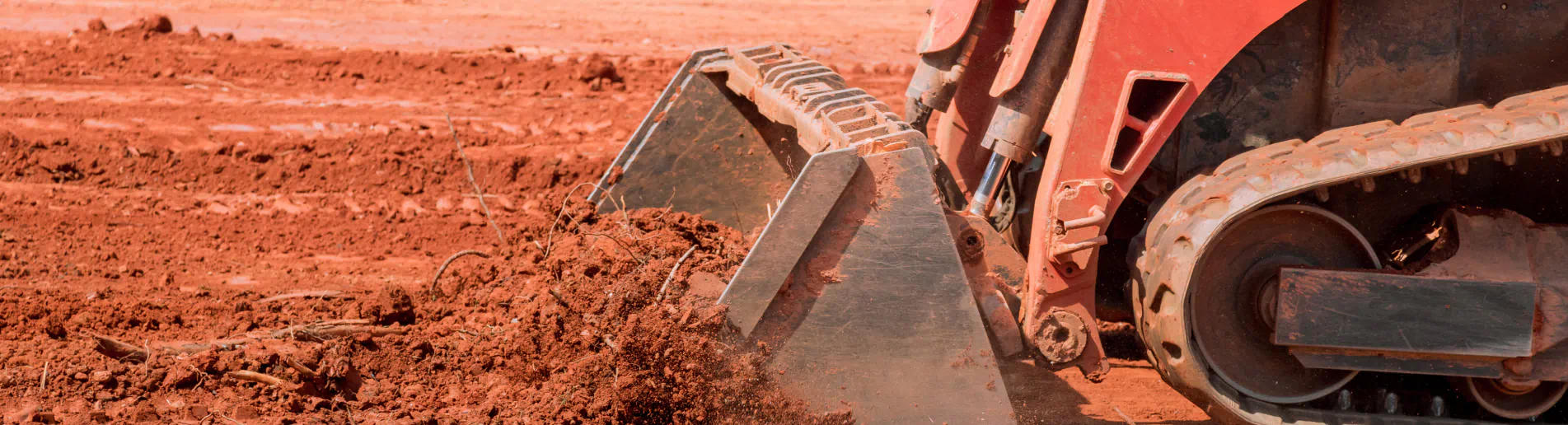 close up shot of land levelling for house pad preparation